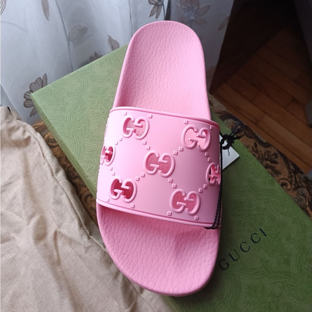 SOLD Another pair …Gucci logo rubber slides